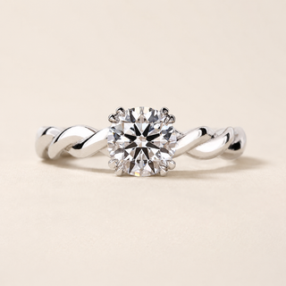 Infinity Round Lab Grown Diamond Hidden Halo Engagement Ring with Twisted Infinity Pavé Shank in White Gold