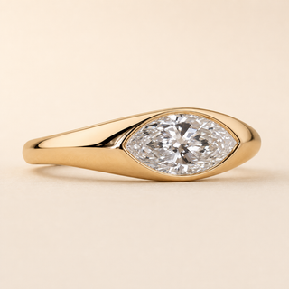 Modern Marquise Lab Grown Diamond Bezel Engagement Ring with Wide Tapered Band in Yellow Gold