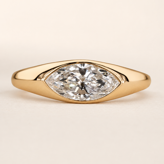 Modern Marquise Lab Grown Diamond Bezel Engagement Ring with Wide Tapered Band in Yellow Gold