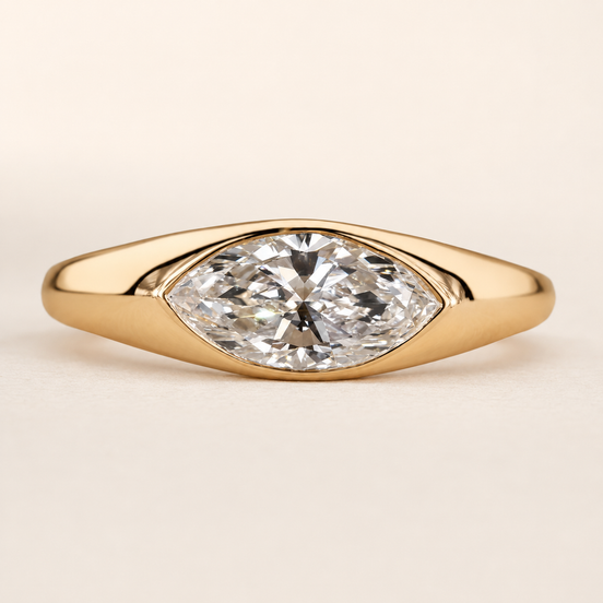 Modern Marquise Lab Grown Diamond Bezel Engagement Ring with Wide Tapered Band in Yellow Gold