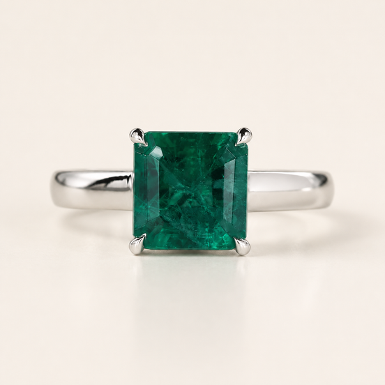 Green birthstone cathedral basket gemstone engagement ring in white gold