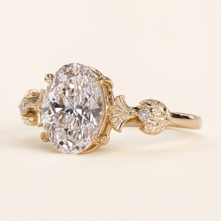 Aurora Oval Lab Grown Diamond Three-Stone Engagement Ring with Leaf Floral Side Clusters in Yellow Gold