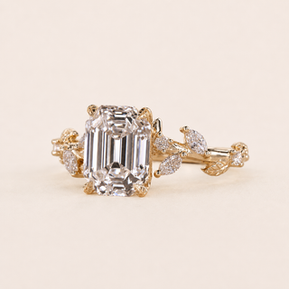 Aurora Emerald Lab Grown Diamond Three-Stone Engagement Ring with Leaf Diamond Clusters in Yellow Gold