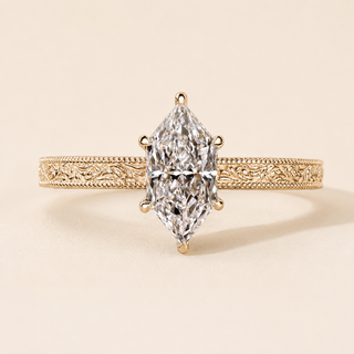 Dutch marquise lab grown diamond cathedral engagement ring in yellow gold with milgrain ocean-wave band