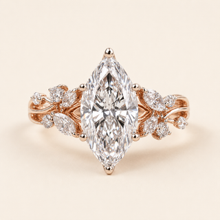 Marquise cut lab grown diamond cluster engagement ring in rose gold with mixed-shape leaf and open vine shoulders