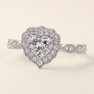 Heart cut lab grown diamond halo engagement ring in white gold with double pavé heart halo and twisted shoulders