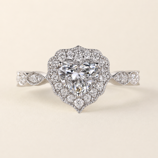 Heart cut lab grown diamond halo engagement ring in white gold with double pavé heart halo and twisted shoulders