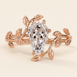 Coffin cut lab grown diamond bypass engagement ring in rose gold with sculptural leaf-and-vine shoulders
