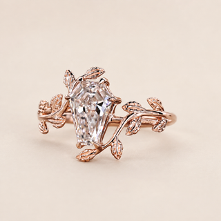 Coffin cut lab grown diamond bypass engagement ring in rose gold with sculptural leaf-and-vine shoulders