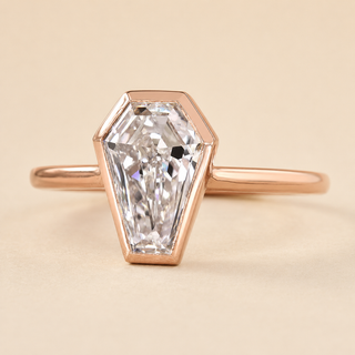 Coffin cut lab grown diamond bezel engagement ring in rose gold with geometric full bezel and plain polished band