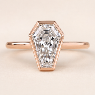 Coffin cut lab grown diamond bezel engagement ring in rose gold with geometric full bezel and plain polished band