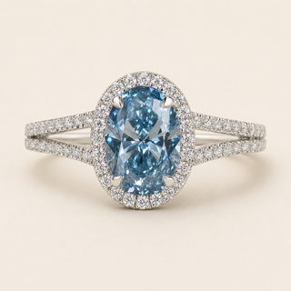 Oval Blue Lab Grown Diamond Halo Engagement Ring in White Gold with Split Cathedral Pavé Shank