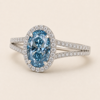 Oval Blue Lab Grown Diamond Halo Engagement Ring in White Gold with Split Cathedral Pavé Shank
