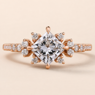 Princess Cut Lab Grown Diamond Engagement Ring in 18K Rose Gold with compass prongs, cathedral pavé band and floral cluster side diamonds