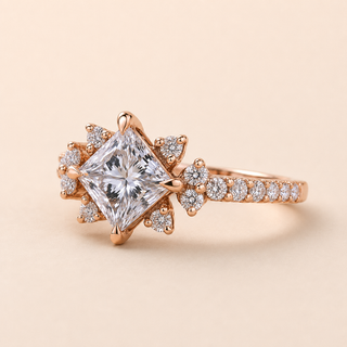 Princess Cut Lab Grown Diamond Engagement Ring in 18K Rose Gold with compass prongs, cathedral pavé band and floral cluster side diamonds