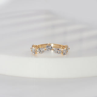 Round cut lab grown diamond chevron anniversary ring in yellow gold with marquise diamond accents