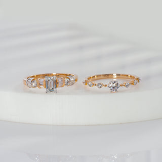 Emerald cut lab grown diamond stacking wedding ring set in yellow gold with baguette and round diamond bands