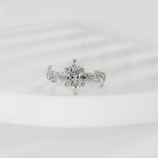 Dutch marquise lab grown diamond floral engagement ring in white gold with leaf-and-vine shoulders and diamond accents