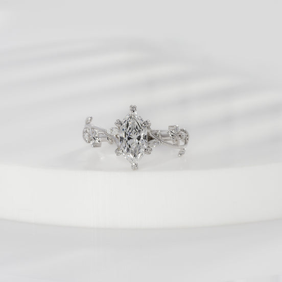 Dutch marquise lab grown diamond floral engagement ring in white gold with leaf-and-vine shoulders and diamond accents