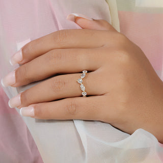 Round cut lab grown diamond chevron anniversary ring in yellow gold with marquise diamond accents