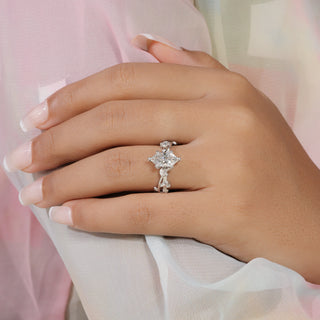 Dutch marquise lab grown diamond floral engagement ring in white gold with leaf-and-vine shoulders and diamond accents