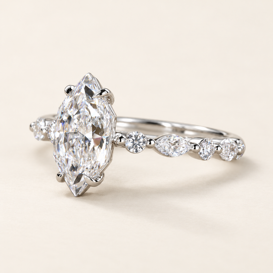 Marquise cut lab grown diamond engagement ring in white gold with elongated Dutch marquise center and alternating marquise and round diamond shoulders.