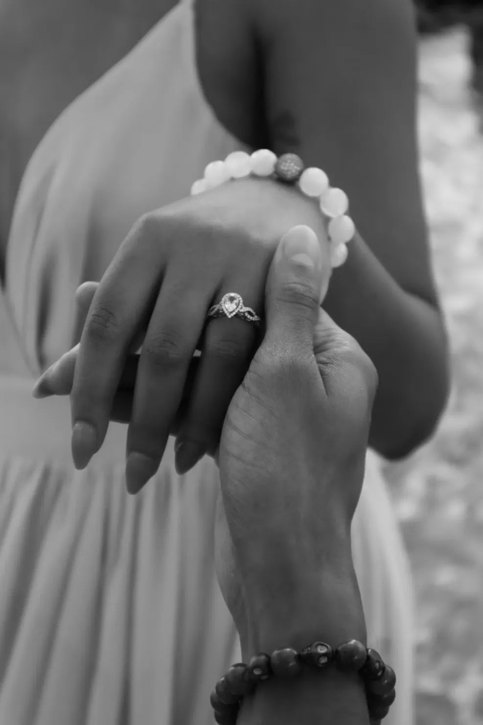 Hands wearing a Signora ring