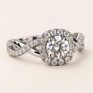 Round lab grown diamond split shank engagement ring in white gold with pavé halo, one diamond-set arm and one polished arm