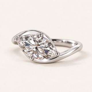 East-west marquise lab grown diamond bypass engagement ring in white gold with curved shoulders and four rounded prongs
