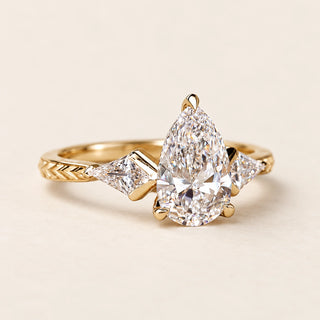 Deco Pear Cut Lab Grown Diamond Three-Stone Engagement Ring in Yellow Gold