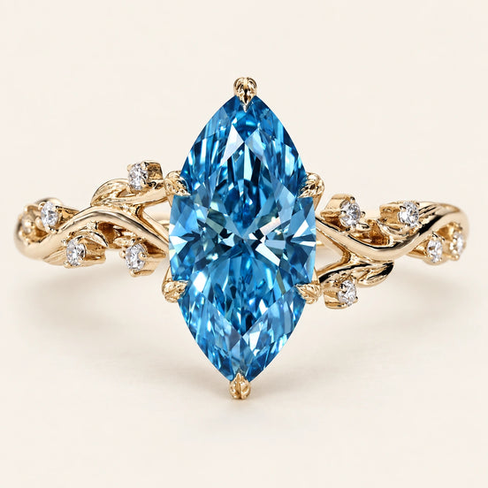 Blue Marquise Lab Grown Diamond Side Stone Engagement Ring in Yellow Gold