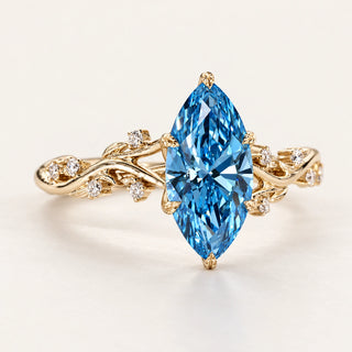 Blue Marquise Lab Grown Diamond Side Stone Engagement Ring in Yellow Gold