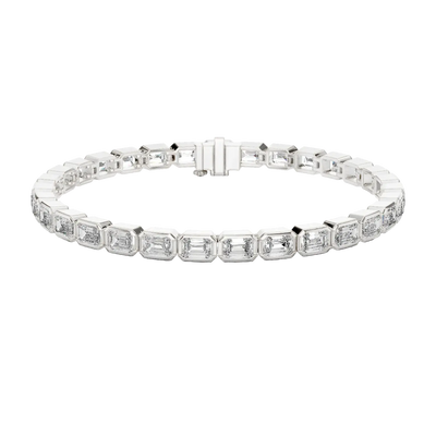Silver bracelet with rectangular gemstones on a white background