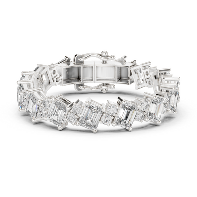 Luxury emerald cut diamond tennis bracelet in gold with round accent diamonds by Signora Jewels