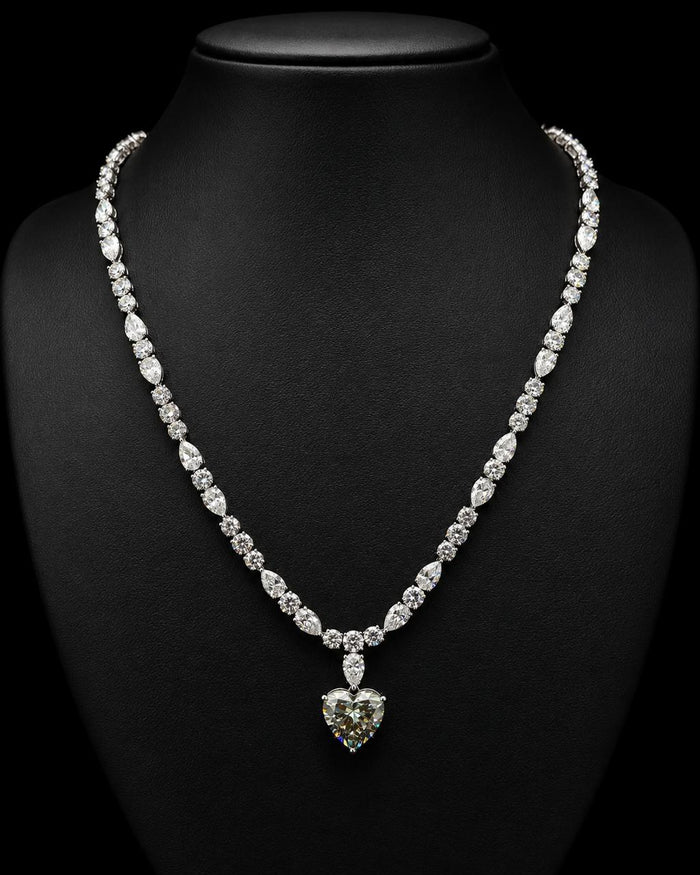 White gold necklace with 6.02ct green heart and white lab grown diamonds on black
