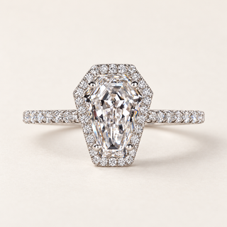 Coffin cut lab grown diamond halo engagement ring in white gold with four center prongs, geometric halo and pavé shoulders