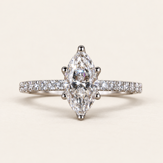 Marquise lab grown diamond engagement ring in white gold with six-prong center, protected tips and diamond-set shoulders