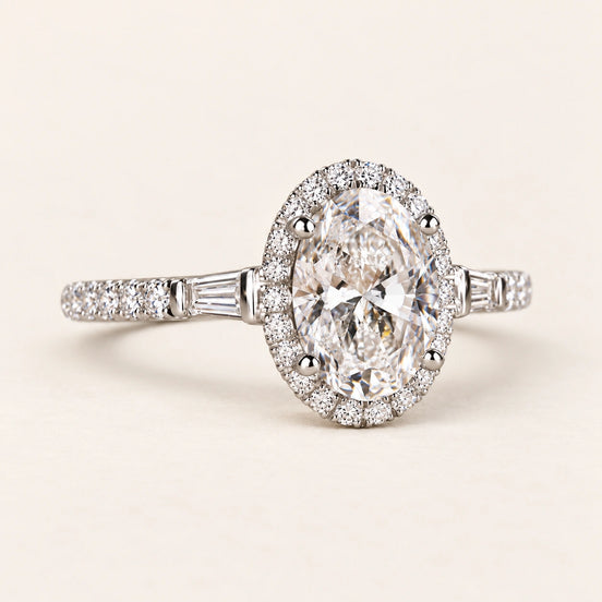 Oval Cut Lab Grown Diamond Halo Side Stone Engagement Ring in White Gold