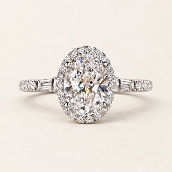 Oval Cut Lab Grown Diamond Halo Side Stone Engagement Ring in White Gold