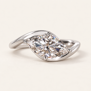 East-west marquise lab grown diamond bypass engagement ring in white gold with curved shoulders and four rounded prongs