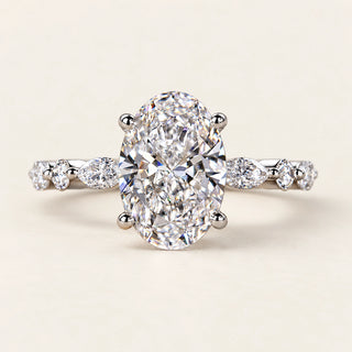 Oval Cut Lab Grown Diamond Four-Prong Engagement Ring with Marquise Side Stones in White Gold