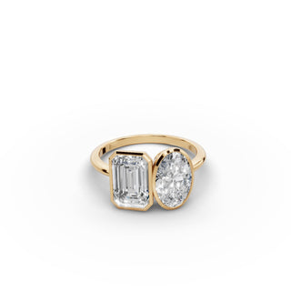 Emerald and Oval Lab Grown Diamond Bezel Toi et Moi Ring in yellow gold, view 2
