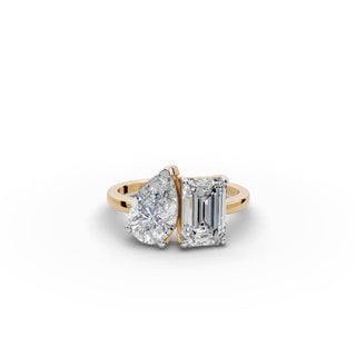 Emerald and Pear Lab Grown Diamond Toi et Moi Ring in yellow gold, front view