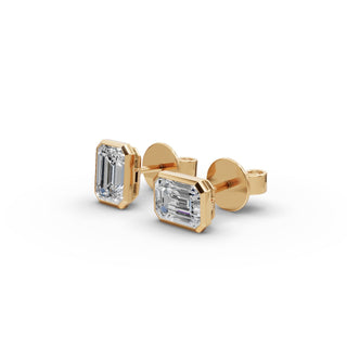 Emerald Lab Grown Diamond Bezel Stud Earrings in yellow gold, front view