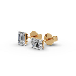 Emerald Lab Grown Diamond Four Prong Stud Earrings in yellow gold, front view