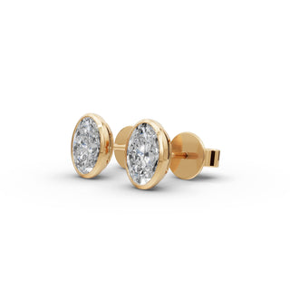 Oval Lab Grown Diamond Bezel Stud Earrings in yellow gold, front view