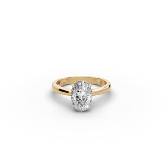 Oval Lab Grown Diamond Petite Four Prong Solitaire Ring in yellow gold, front view