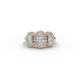 Oval Lab Grown Diamond Three Stone Ring with Round Side Stones in yellow gold, front view
