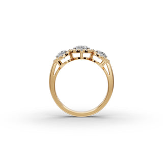 Oval Lab Grown Diamond Three Stone Ring with Round Side Stones in yellow gold, view 2
