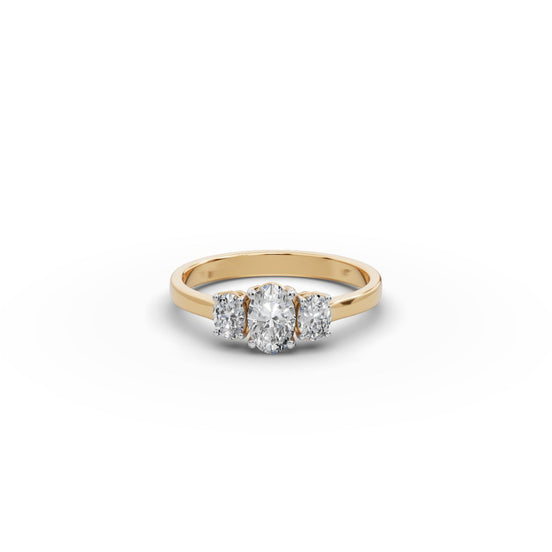 Oval Lab Grown Diamond Three Stone Ring in yellow gold, front view